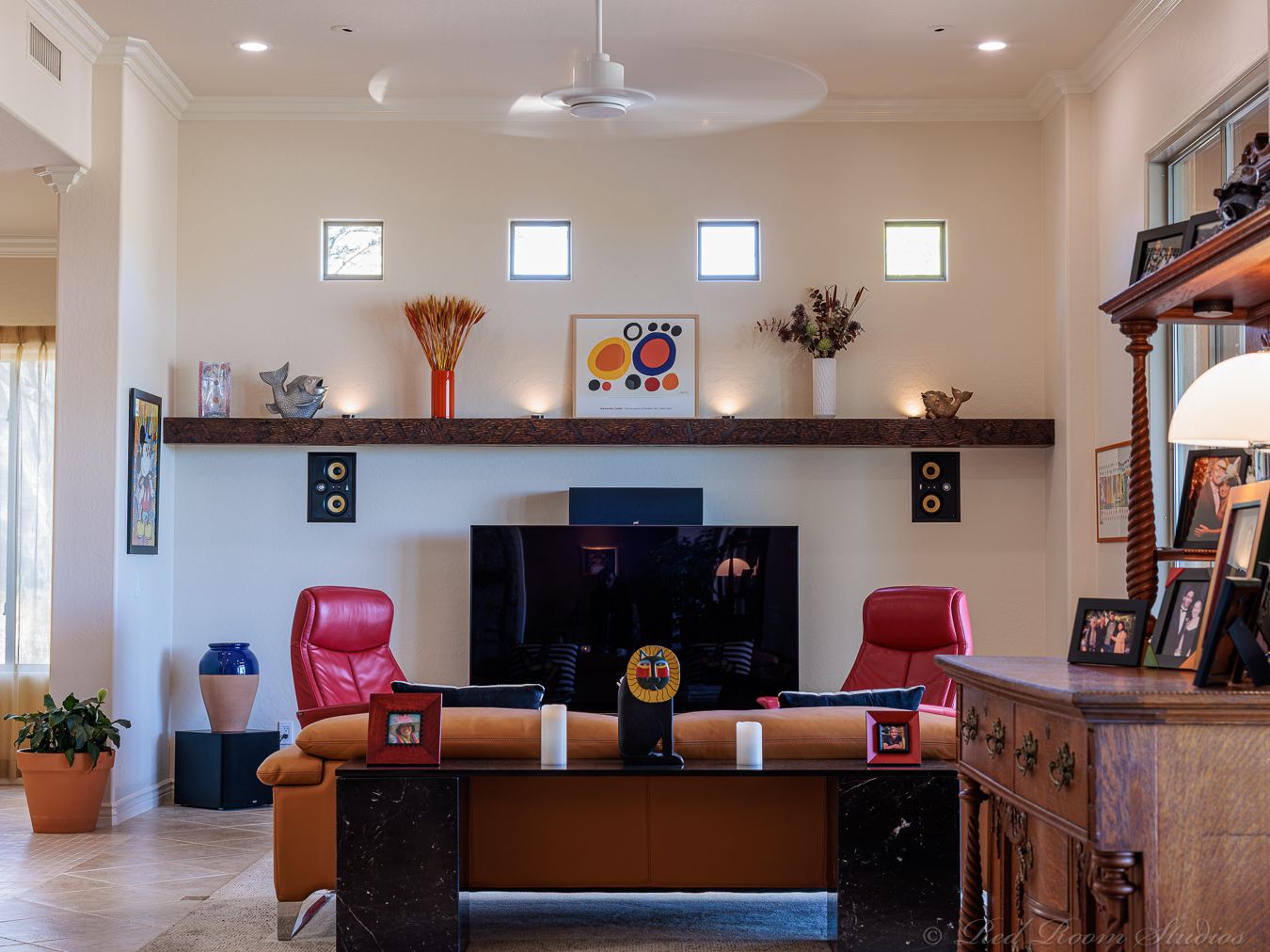 Finished Phoenix living room with repainted walls, ceiling and a dark stained mantel shelf