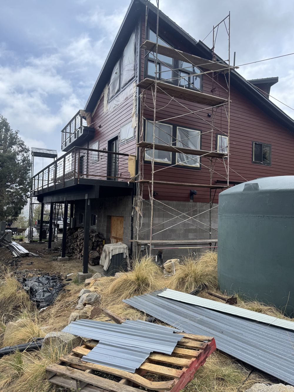 Scaffolding set against an Arizona property during an exterior repaint